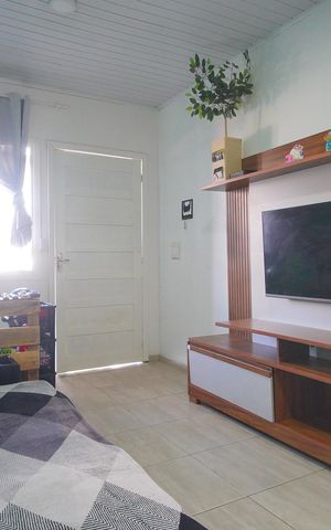 Casa à venda com 80m², 2 quartos e 2 vagasSala