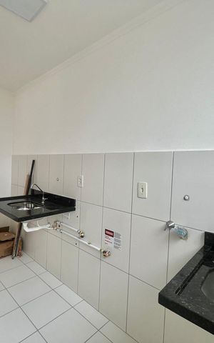 Apartamento à venda com 44m², 2 quartos e 1 vaga Apartamento à venda com 44m², 2 quartos e 1 vagaCozinha a Área de Serviço