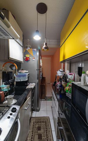 Apartamento à venda com 45m², 2 quartos e sem vaga Apartamento à venda com 45m², 2 quartos e sem vagaCozinha e Área de Serviço