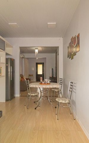 Casa à venda com 132m², 2 quartos e 2 vagas Casa à venda com 132m², 2 quartos e 2 vagasCozinha