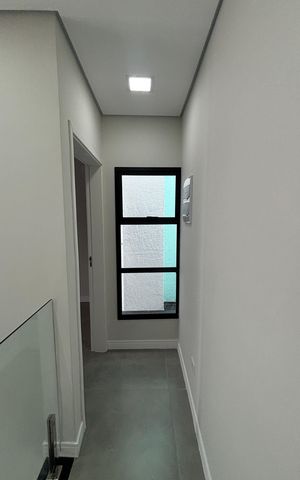 Casa à venda com 155m², 3 quartos e 3 vagas Casa à venda com 155m², 3 quartos e 3 vagasCorredor