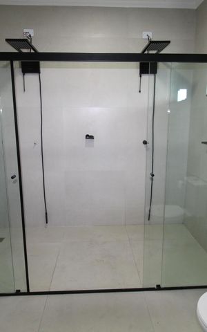 Casa de condomínio para alugar com 460m², 4 quartos e 4 vagasBanheiro da Suíte 2