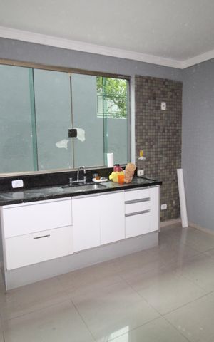 Casa de condomínio para alugar com 460m², 4 quartos e 4 vagasCozinha