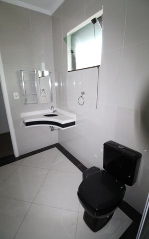 Casa de condomínio para alugar com 460m², 4 quartos e 4 vagasBanheiro