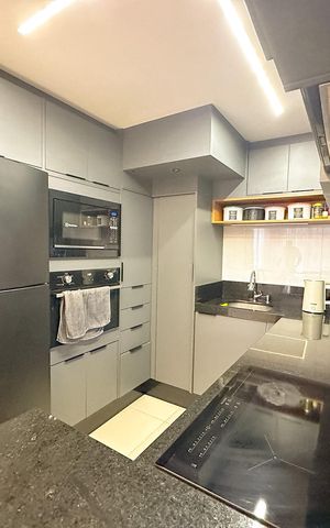 Casa de condomínio para alugar com 112m², 3 quartos e 2 vagasCozinha
