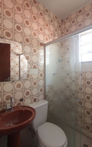 Casa de condomínio à venda com 65m², 2 quartos e 2 vagasBanheiro da Suite