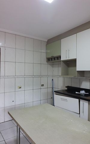 Casa para alugar com 100m², 3 quartos e 2 vagasCozinha 