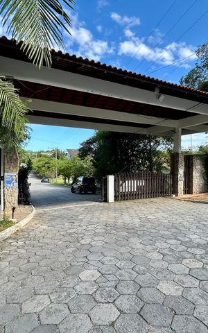 Casa de condomínio para alugar com 385m², 4 quartos e 4 vagas Casa de condomínio para alugar com 385m², 4 quartos e 4 vagasFachada