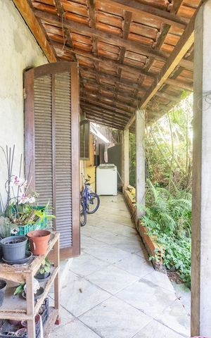 Casa à venda com 225m², 3 quartos e 5 vagas Casa à venda com 225m², 3 quartos e 5 vagasCasa 1 - varanda