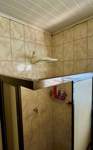 Casa à venda com 180m², 3 quartos e 3 vagas Casa à venda com 180m², 3 quartos e 3 vagasBanheiro 1