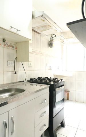 Apartamento à venda com 59m², 2 quartos e 1 vaga Apartamento à venda com 59m², 2 quartos e 1 vagaCozinha e Área de Serviço