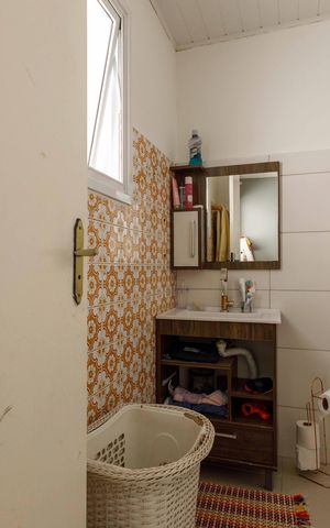 Casa à venda com 170m², 4 quartos e 2 vagasBanheiro da Suíte 2 