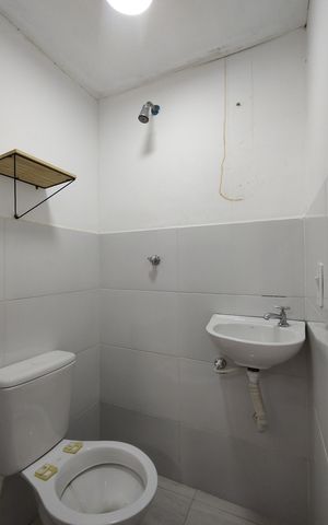 Casa de condomínio à venda com 143m², 2 quartos e 2 vagasBanheiro de serviço