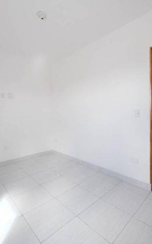 Casa de condomínio à venda com 60m², 2 quartos e 1 vagaSuíte 1
