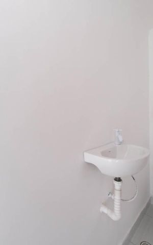 Casa de condomínio à venda com 60m², 2 quartos e 1 vagaLavabo
