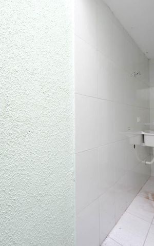 Casa de condomínio à venda com 60m², 2 quartos e 1 vagaÁrea de Serviço