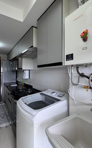 Apartamento à venda com 84m², 3 quartos e 1 vaga Apartamento à venda com 84m², 3 quartos e 1 vagaCozinha e Área de Serviço