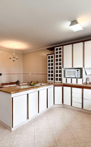 Casa à venda com 350m², 4 quartos e 4 vagas Casa à venda com 350m², 4 quartos e 4 vagasCozinha
