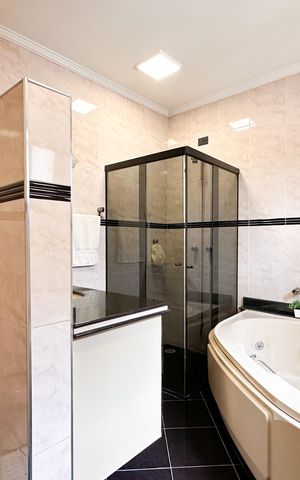 Casa à venda com 350m², 4 quartos e 4 vagas Casa à venda com 350m², 4 quartos e 4 vagasBanheiro da Suíte 2