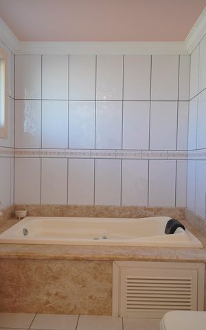 Casa à venda com 267m², 4 quartos e 2 vagasBanheiro da Suíte