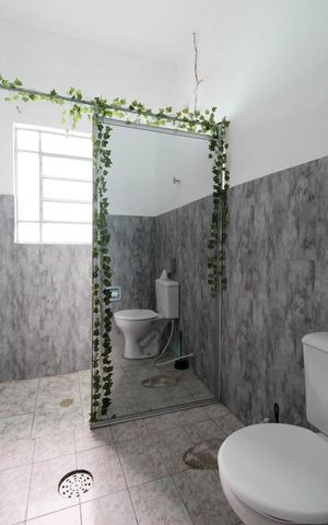 Casa à venda com 104m², 2 quartos e 1 vagaBanheiro