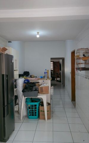 Casa à venda com 134m², 3 quartos e 2 vagas Casa à venda com 134m², 3 quartos e 2 vagasCozinha
