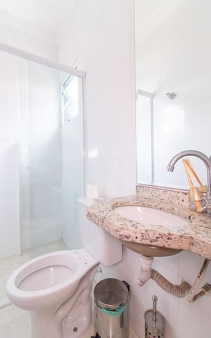 Casa de condomínio à venda com 83m², 2 quartos e 1 vagaBanheiro da Suíte 1