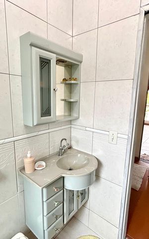 Casa à venda com 160m², 3 quartos e 2 vagas Casa à venda com 160m², 3 quartos e 2 vagasBanheiro da Suíte