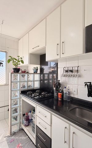 Apartamento à venda com 60m², 2 quartos e 1 vagaCozinha com área de serviço