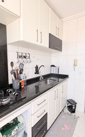 Apartamento à venda com 60m², 2 quartos e 1 vagaCozinha com área de serviço