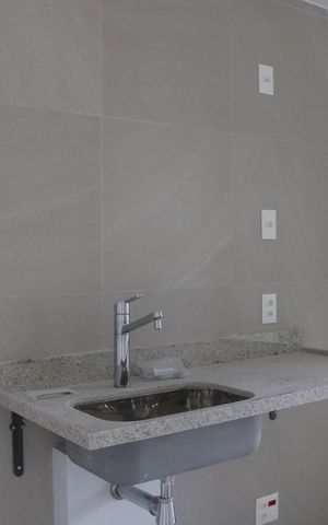 Apartamento à venda com 60m², 2 quartos e 1 vagaCozinha e Área de Serviço