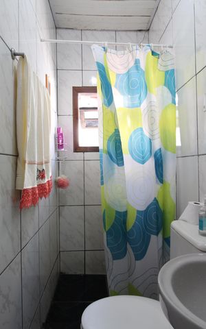 Casa de condomínio à venda com 91m², 3 quartos e 3 vagasBanheiro 2