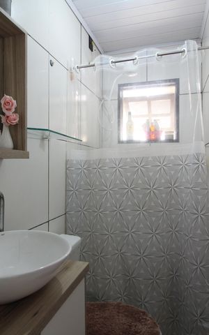 Casa de condomínio à venda com 91m², 3 quartos e 3 vagasBanheiro 1
