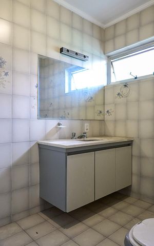 Casa à venda com 327m², 4 quartos e 2 vagasBanheiro Suíte 1