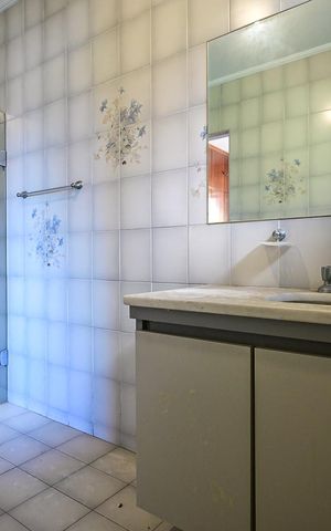 Casa à venda com 327m², 4 quartos e 2 vagasBanheiro Suíte 1