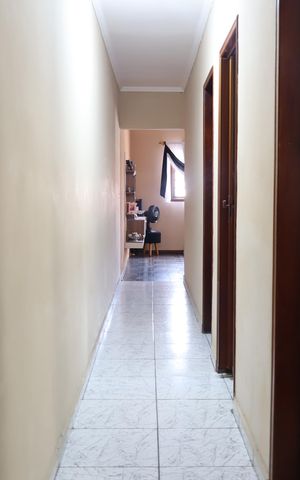 Casa à venda com 199m², 4 quartos e 2 vagasCorredor da casa de cima