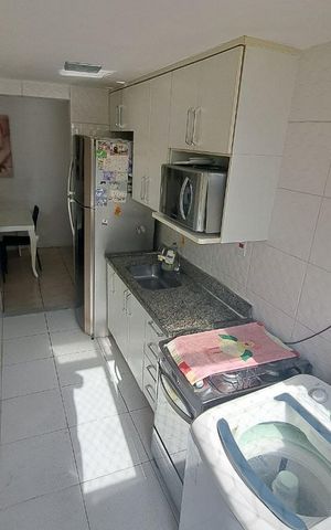 Apartamento à venda com 52m², 2 quartos e 1 vagaCozinha e Área de Serviço