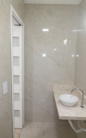 Casa de condomínio à venda com 110m², 3 quartos e 3 vagasBanheiro 2