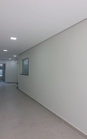 Casa à venda com 263m², 3 quartos e 6 vagasCorredor da Garagem 
