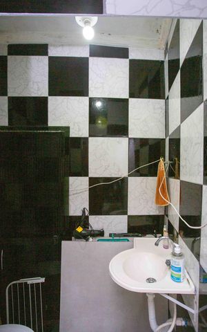 Casa à venda com 80m², 2 quartos e sem vagaBanheiro da Suíte