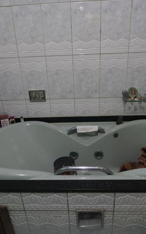 Casa de condomínio para alugar com 450m², 6 quartos e 3 vagasBanheiro da suíte 3