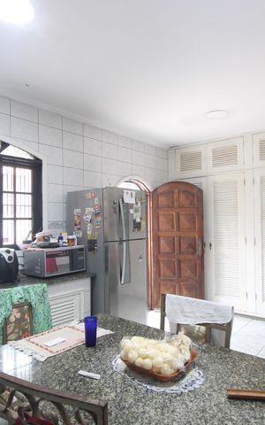 Casa de condomínio para alugar com 450m², 6 quartos e 3 vagasCozinha