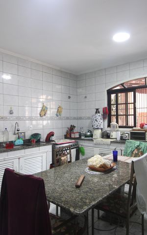 Casa de condomínio para alugar com 450m², 6 quartos e 3 vagasCozinha