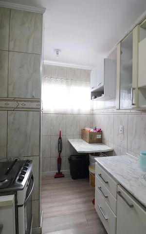Apartamento à venda com 57m², 2 quartos e 1 vagaCozinha e Área de Serviço