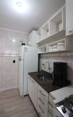 Apartamento à venda com 57m², 2 quartos e 1 vagaCozinha e Área de Serviço