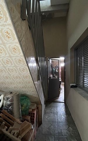 Casa à venda com 210m², 4 quartos e 1 vagaEntrada do quarto de serviço 