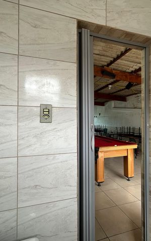 Casa à venda com 210m², 4 quartos e 1 vagaBanheiro do Salão de Festas e Churrasqueira