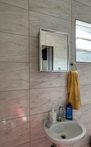 Casa à venda com 210m², 4 quartos e 1 vagaBanheiro do Salão de Festas e Churrasqueira