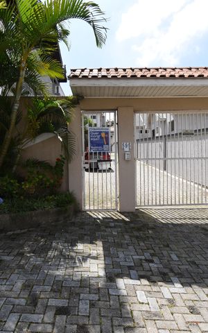 Casa de condomínio à venda com 86m², 3 quartos e 2 vagasFachada com Placa