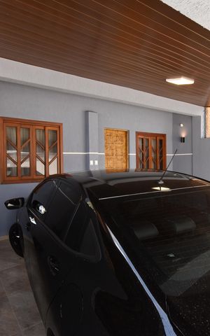 Casa de condomínio à venda com 86m², 3 quartos e 2 vagasVaranda/Garagem
